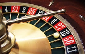 Playing Roulette at a live dealer casino.